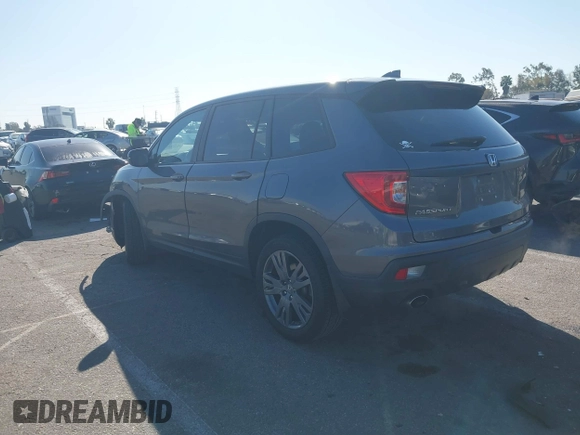 2019 Honda Passport EX-L with VIN 5FNYF7H58KB006501, listed as a IAAI auction lot 41752416 with 60,820 mi miles and . Bid and sale history available at carsss.com. Image 3.