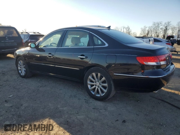 2009 Hyundai Azera Limited z VIN KMHFC46F79A341743, wystawiony jako Copart lot #83299354 z przebiegiem 98 779 mil mil oraz Szkoda całkowita • Salvage title. Historia ofert i sprzedaży dostępna na DreamBid. Obrazek 2.