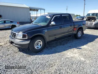 2001 Ford F-150 XLT with VIN 1FTRW07W11KE08545, listed as a Copart auction lot 49869415 with 264,349 mi miles and Salvage title. Bid and sale history available at DreamBid. Image 1.