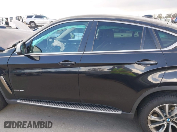 2016 BMW X6 xDrive35i z VIN 5UXKU2C50G0N83968, wystawiony jako IAAI lot #41958971 z przebiegiem 70 738 mil mil oraz . Historia ofert i sprzedaży dostępna na DreamBid. Obrazek 14.