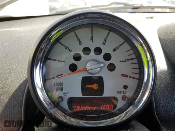 2012 MINI Countryman S z VIN WMWZC5C52CWL55608, wystawiony jako Copart lot #56424275 z przebiegiem 126 669 mil mil oraz Szkoda całkowita • Salvage title. Historia ofert i sprzedaży dostępna na DreamBid. Obrazek 9.