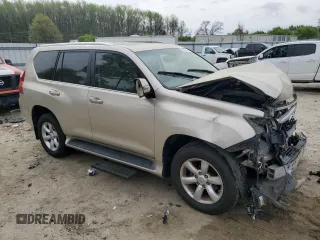 2011 Lexus GX 460 with VIN JTJBM7FX9B5021992, listed as a Copart auction lot 51587885 with 141,677 mi miles and Salvage Title. Bid and sale history available at DreamBid. Image 4.