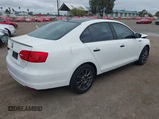 2014 Volkswagen Jetta S with VIN 3VW2K7AJ6EM233000, listed as a IAAI auction lot 41895391 with 130,692 mi miles and . Bid and sale history available at DreamBid. Image 4.