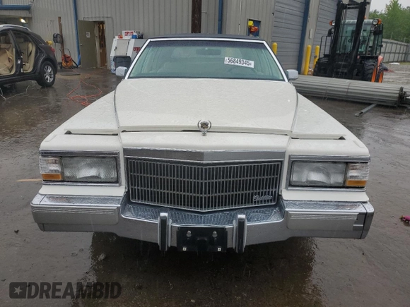 1992 Cadillac Brougham with VIN 1G6DW54E5NR708009, listed as a Copart auction lot 56849345 with 83,203 mi miles and Salvage title. Bid and sale history available at DreamBid. Image 5.