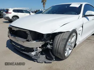 2015 BMW 4 Series 428i with VIN WBA4A9C50FGL85857, listed as a IAAI auction lot 42542619 with 136,411 mi miles and . Bid and sale history available at DreamBid. Image 6.
