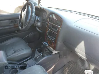 2000 Infiniti QX4 z VIN JNRAR07YXYW085007, wystawiony jako IAAI lot #41671667 z przebiegiem 309 951 mil mil oraz . Historia ofert i sprzedaży dostępna na DreamBid. Obrazek 5.