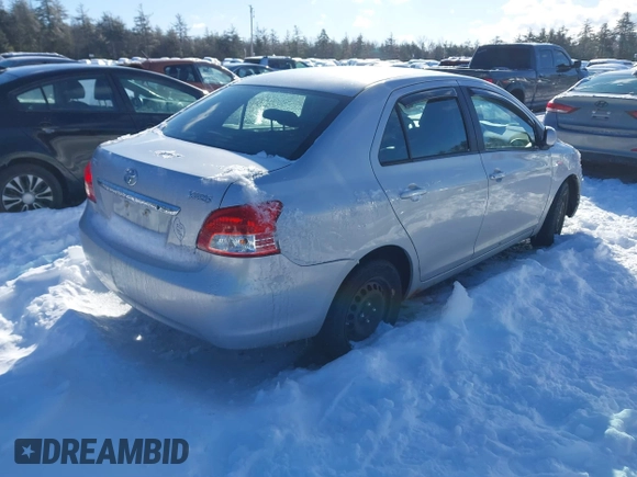 2009 Toyota Yaris with VIN JTDBT903191334821, listed as a IAAI auction lot 41598934 with 235,248 mi miles. Bid and sale history available at carsss.com. Image 4.