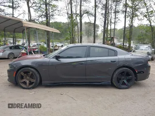 2015 Dodge Charger RT with VIN 2C3CDXCT3FH730588, listed as a IAAI auction lot 42023763 with 118,634 mi miles and . Bid and sale history available at DreamBid. Image 14.
