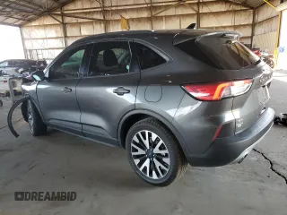 2020 Ford Escape SE Sport Hybrid z VIN 1FMCU9BZ0LUA63674, wystawiony jako Copart lot #59689745 z przebiegiem 157 935 mil mil oraz Szkoda całkowita • Salvage title. Historia ofert i sprzedaży dostępna na DreamBid. Obrazek 2.