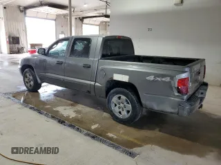 2005 Dodge Dakota SLT z VIN 1D7HW48N95S166589, wystawiony jako Copart lot #54868565 z przebiegiem 228 682 mil mil oraz Szkoda całkowita • Salvage title. Historia ofert i sprzedaży dostępna na DreamBid. Obrazek 2.
