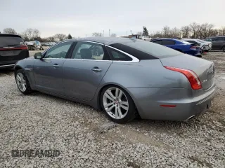 2015 Jaguar XJ with VIN SAJWA2GZ4F8V82350, listed as a Copart auction lot 83824414 with 47,767 mi miles and Salvage Title. Bid and sale history available at carsss.com. Image 2.