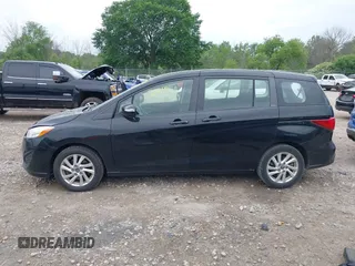 2015 Mazda 5 Sport with VIN JM1CW2BL2F0190990, listed as a IAAI auction lot 42532210 with 98,528 mi miles and . Bid and sale history available at DreamBid. Image 14.
