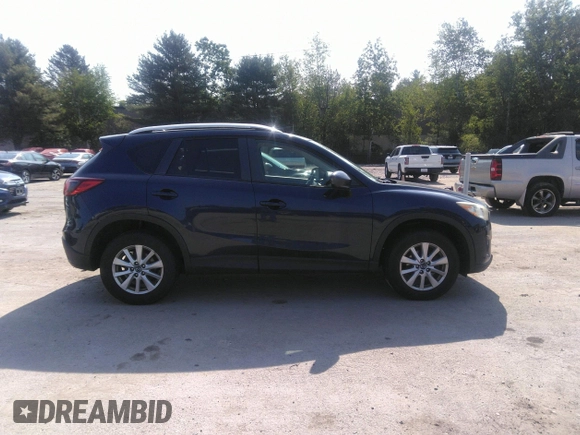 2014 Mazda CX-5 Touring z VIN JM3KE2CYXE0429149, wystawiony jako IAAI lot #42471772 z przebiegiem 222 440 mil mil oraz . Historia ofert i sprzedaży dostępna na DreamBid. Obrazek 13.