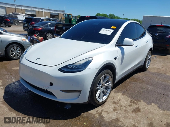 2020 Tesla Model Y Long Range z VIN 5YJYGDEE0LF035248, wystawiony jako IAAI lot #42162191 z przebiegiem 115 533 mil mil oraz . Historia ofert i sprzedaży dostępna na DreamBid. Obrazek 20.