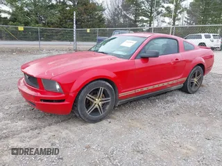 2007 Ford Mustang Deluxe z VIN 1ZVFT80N475246636, wystawiony jako IAAI lot #41620976 z przebiegiem 310 653 mil mil oraz . Historia ofert i sprzedaży dostępna na DreamBid. Obrazek 2.