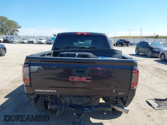 2016 GMC Sierra 1500 SLT with VIN 3GTU2NEC4GG285688, listed as a IAAI auction lot 40394598 with 121,940 mi miles and . Bid and sale history available at DreamBid. Image 16.