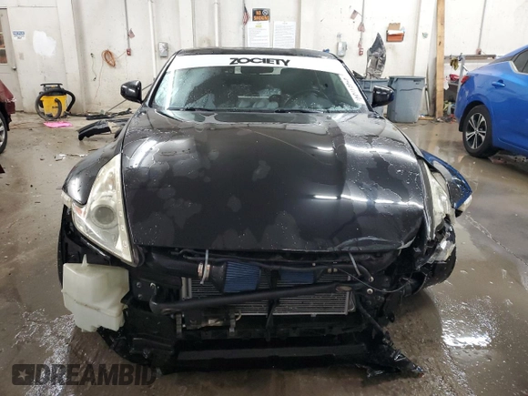 2009 Nissan 370Z z VIN JN1AZ44EX9M407193, wystawiony jako Copart lot #84891734 z przebiegiem 129 296 mil mil oraz Szkoda całkowita • Salvage title. Historia ofert i sprzedaży dostępna na DreamBid. Obrazek 5.
