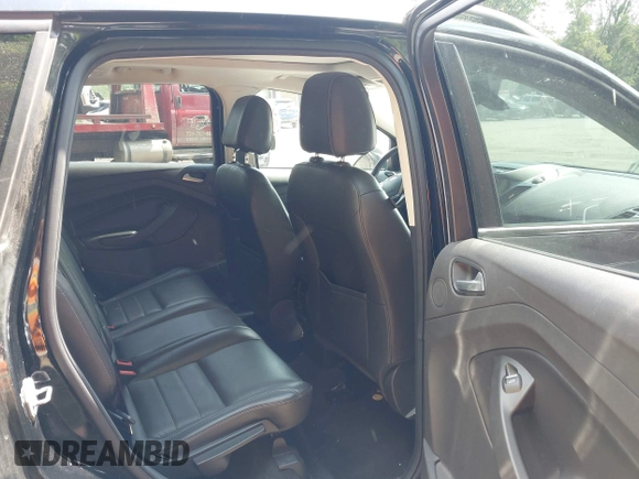 2016 Ford Escape Titanium with VIN 1FMCU9JX1GUC18335, listed as a IAAI auction lot 42396492 with 147,522 mi miles and . Bid and sale history available at DreamBid. Image 8.