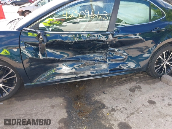 2018 Toyota Camry LE with VIN 4T1B11HK2JU579550, listed as a IAAI auction lot 42309663 with 40,868 mi miles and . Bid and sale history available at DreamBid. Image 6.