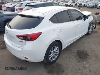 2014 Mazda Mazda3 i Touring with VIN JM1BM1L7XE1113628, listed as a IAAI auction lot 41218193 with 166,469 mi miles. Bid and sale history available at carsss.com. Image 4.
