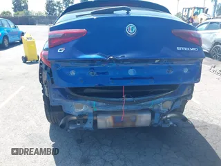 2019 Alfa Romeo Stelvio z VIN ZASPAKAN5K7C29955, wystawiony jako IAAI lot #42096049 z przebiegiem 85 935 mil mil oraz . Historia ofert i sprzedaży dostępna na DreamBid. Obrazek 6.