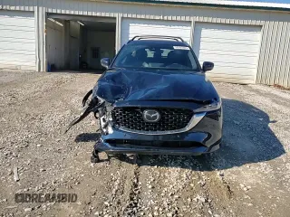 2023 Mazda CX-5 Signature with VIN JM3KFBXY9P0122887, listed as a Copart auction lot 88993465 with 12,116 mi miles and Salvage Title. Bid and sale history available at carsss.com. Image 14.