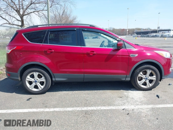 2016 Ford Escape SE with VIN 1FMCU9G99GUA89298, listed as a IAAI auction lot 42013116 with 192,408 mi miles. Bid and sale history available at carsss.com. Image 13.