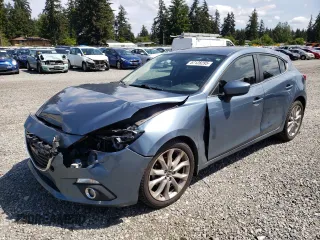 2014 Mazda 3 S Grand Touring z VIN JM1BM1M31E1177276, wystawiony jako Copart lot #57128295 z przebiegiem 122 607 mil mil oraz Szkoda całkowita • Salvage title. Historia ofert i sprzedaży dostępna na DreamBid. Obrazek 1.