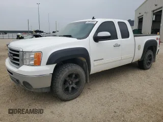 2012 GMC Sierra 1500 SLT z VIN 1GTR2WE79CZ277711, wystawiony jako Copart lot #60843925 z przebiegiem 184 804 mil mil oraz Czysty tytuł • Clean title. Historia ofert i sprzedaży dostępna na DreamBid. Obrazek 1.