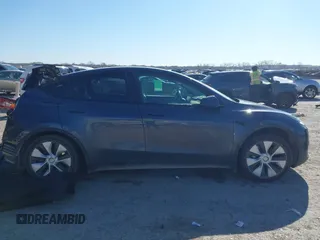 2023 Tesla Model Y Long Range with VIN 7SAYGAEE8PF667728, listed as a IAAI auction lot 41839771 with 32,654 mi miles and . Bid and sale history available at DreamBid. Image 13.