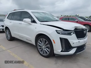 2020 Cadillac XT6 AWD Sport with VIN 1GYKPGRSXLZ102062, listed as a IAAI auction lot 42469433 with 89,818 mi miles and . Bid and sale history available at DreamBid. Image 1.