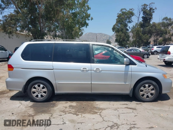 2004 Honda Odyssey EX-L with VIN 5FNRL18774B028164, listed as a IAAI auction lot 42454877 with 135,720 mi miles and . Bid and sale history available at DreamBid. Image 13.