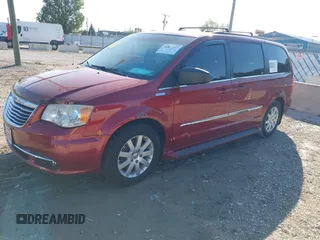 2014 Chrysler Town & Country Touring with VIN 2C4RC1BG9ER157652, listed as a IAAI auction lot 40449592 with 156,131 mi miles. Bid and sale history available at carsss.com. Image 2.
