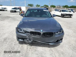 2014 BMW 3 Series 328i with VIN WBA3A5G56ENP33167, listed as a Copart auction lot 61406885 with 125,967 mi miles and Salvage title. Bid and sale history available at DreamBid. Image 5.