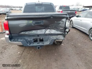 2018 Toyota Tacoma SR5 with VIN 3TMAZ5CN5JM068632, listed as a IAAI auction lot 41634912 with 73,989 mi miles. Bid and sale history available at carsss.com. Image 6.