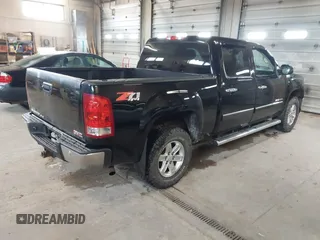 2012 GMC Sierra 1500 SLE with VIN 3GTP2VE72CG198155, listed as a IAAI auction lot 42081020 with 143,843 mi miles and . Bid and sale history available at DreamBid. Image 4.