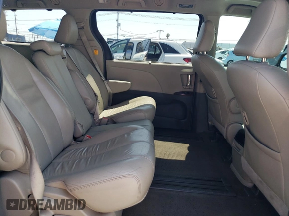 2013 Toyota Sienna XLE AAS с VIN 5TDYK3DC6DS322289, выставлен на аукционе Copart как лот 54626135 с пробегом 131 203 миль миль и Списание • Salvage title. История ставок и продаж доступна на DreamBid. Изображение 11.