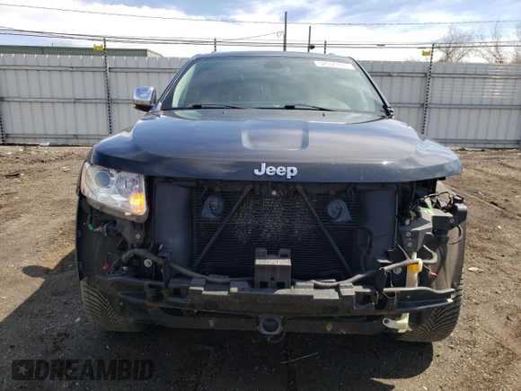 2013 Jeep Grand Cherokee Overland with VIN 1C4RJFCT2DC576125, listed as a Copart auction lot 52595165 with 100,361 mi miles and Salvage Title. Bid and sale history available at carsss.com. Image 5.
