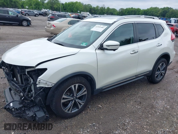 2017 Nissan Rogue SV with VIN 5N1AT2MVXHC844775, listed as a IAAI auction lot 42351482 with 87,195 mi miles and . Bid and sale history available at DreamBid. Image 2.