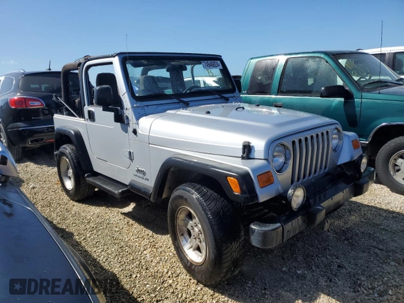 2004 Jeep Wrangler Sport with VIN 1J4FA49SX4P776775, listed as a Copart auction lot 74946824 with Not Provided miles and Salvage Title. Bid and sale history available at carsss.com. Image 4.