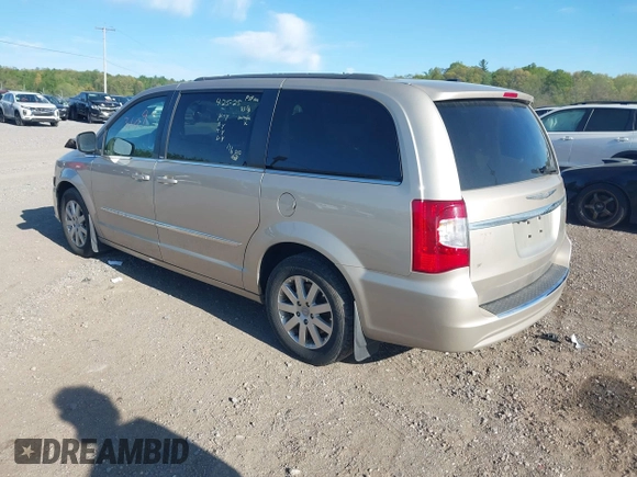 2013 Chrysler Town & Country Touring with VIN 2C4RC1BG7DR621665, listed as a IAAI auction lot 42133109 with 135,898 mi miles and . Bid and sale history available at DreamBid. Image 3.