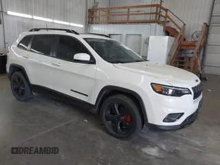 2019 Jeep Cherokee Latitude Plus with VIN 1C4PJMLBXKD294213, listed as a IAAI auction lot 40593826 with 107,332 mi miles. Bid and sale history available at carsss.com. Image 1.