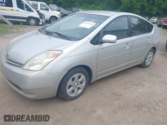 2005 Toyota Prius z VIN JTDKB20U257051452, wystawiony jako IAAI lot #42451660 z przebiegiem 166 106 mil mil oraz . Historia ofert i sprzedaży dostępna na DreamBid. Obrazek 2.