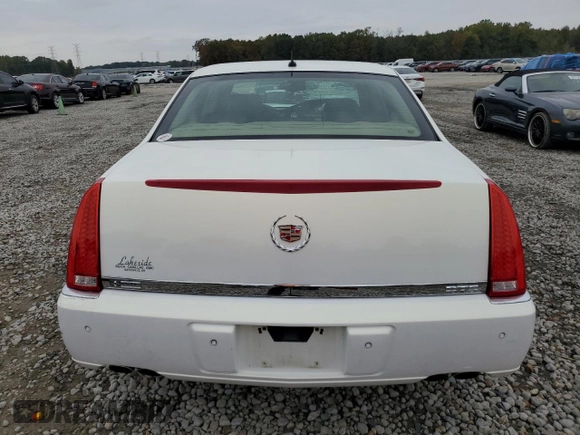 2007 Cadillac DTS Performance z VIN 1G6KD57907U171271, wystawiony jako Copart lot #79007574 z przebiegiem 147 504 mil mil oraz Szkoda całkowita • Salvage title. Historia ofert i sprzedaży dostępna na DreamBid. Obrazek 6.