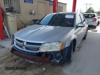 2012 Dodge Avenger SXT with VIN 1C3CDZCB2CN195212, listed as a IAAI auction lot 41374232 with 107,973 mi miles and . Bid and sale history available at DreamBid. Image 2.