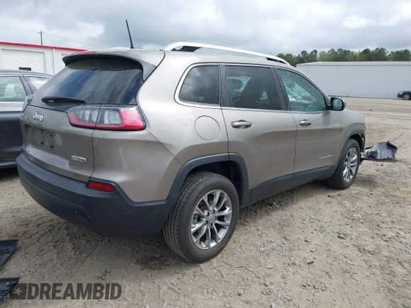 2021 Jeep Cherokee Altitude with VIN 1C4PJLLB8MD164590, listed as a IAAI auction lot 41919423 with 29,672 mi miles and . Bid and sale history available at DreamBid. Image 4.