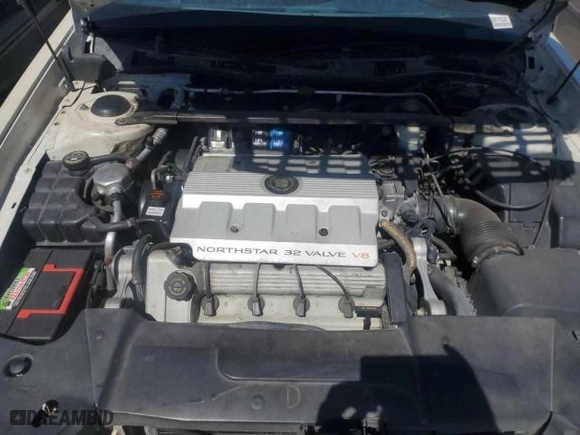 1997 Cadillac DeVille with VIN 1G6KD54Y8VU256755, listed as a Copart auction lot 77669854 with 153,808 mi miles and Clean Title. Bid and sale history available at carsss.com. Image 7.
