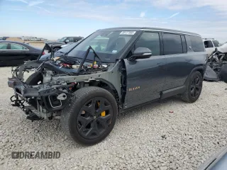 2022 Rivian R1S Launch Edition with VIN 7PDSGABL3NN000739, listed as a Copart auction lot 88127995 with 12,143 mi miles and Salvage Title. Bid and sale history available at carsss.com. Image 1.