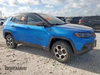 2022 Jeep Compass Trailhawk with VIN 3C4NJDDB6NT162831, listed as a Copart auction lot 66130235 with 34,762 mi miles and Salvage title. Bid and sale history available at DreamBid. Image 4.