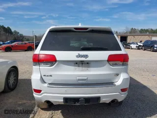 2014 Jeep Grand Cherokee Overland with VIN 1C4RJFCT6EC126897, listed as a IAAI auction lot 41826773 with 115,251 mi miles. Bid and sale history available at carsss.com. Image 16.
